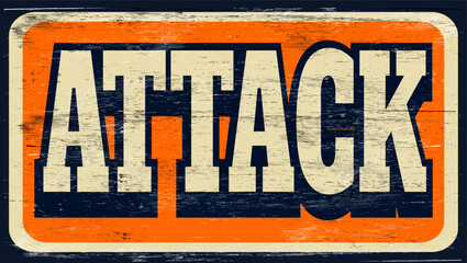 Aged and worn attack sign on wood