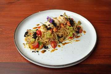 Shrimp Pesto Pasta. Spaghetti with shrimp in pesto sauce. Italian food