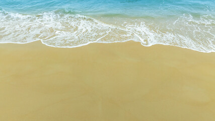 Nature of the beach and sea Summer with sunshine, sandy beaches, clear blue waters sparkling against the blue sky. On an island with good ecology and environment Background for summer vacation