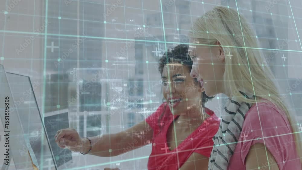 Poster two colleagues pointing at monitor and activating holographic grid during business interface demo
