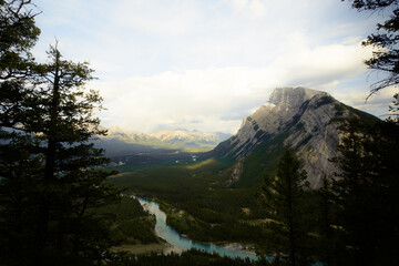mountains with river flowing through 