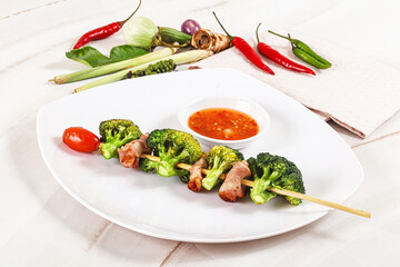 Thai Street foof satay with bacon and broccoli