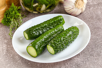Homemade lighty salted cucumbers with herbs