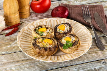 Baked champignon with quail egg
