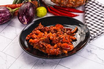 Asian cuisine - pork in chili sauce