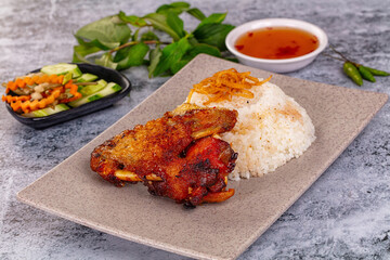 Spicy roasted chicken wing with rice
