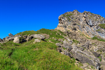 Stony ascent towards mountain summit Pointe des Savolaires in Swiss Alps, Switzerland