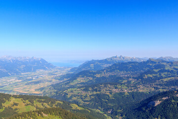 Fototapeta premium Panorama with mountains, Rhone Valley and Lake Geneva in Swiss Alps, Switzerland