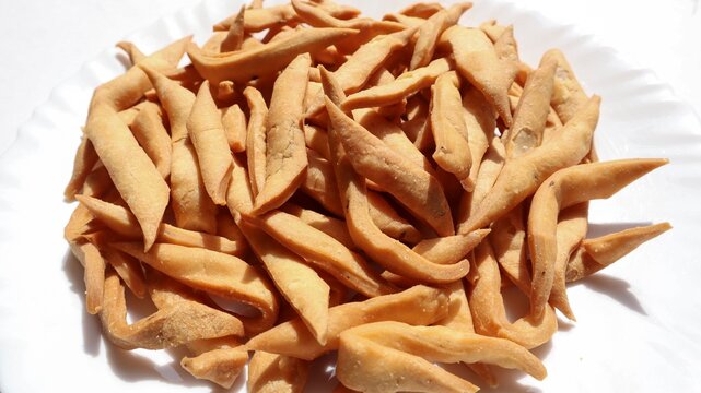 Tasty and crispy Namak para, popular Indian tea time snacks closeup of snacks top view