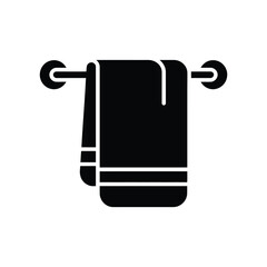 Bathroom towel hanging on wall mounted rack