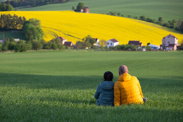 Couple enjoying gorgeous rural landscape in South Moravia region, Czech Republic