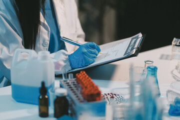 Research, experiment and medical trial being done by a scientist in a lab, science facility or...