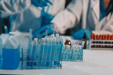 Research, experiment and medical trial being done by a scientist in a lab, science facility or hospital. One young, serious and professional researcher organizing, sorting or making a discovery