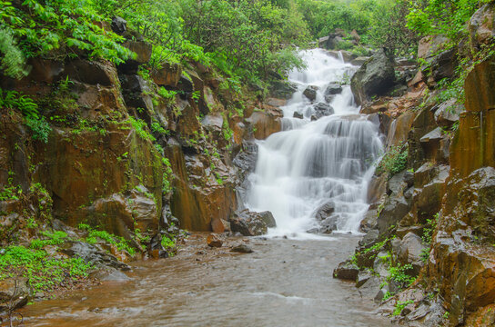 Natural waterfall located in Western Ghats of Maharashtra state in monsoon season Bhor, Pune, Maharashtra, India.