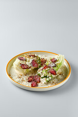 Gourmet Rostbif with Romano Leaves and Vitello Tonnato Sauce on Elegant Plate