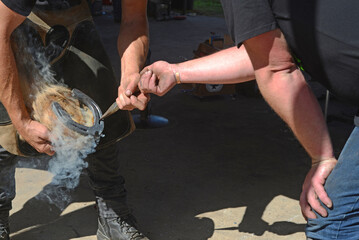 farriers test the horseshoe