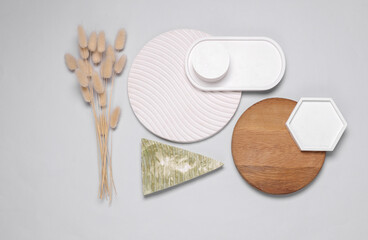 Composition of plaster and wooden figures. Moodboard for design. Top view. Flat lay