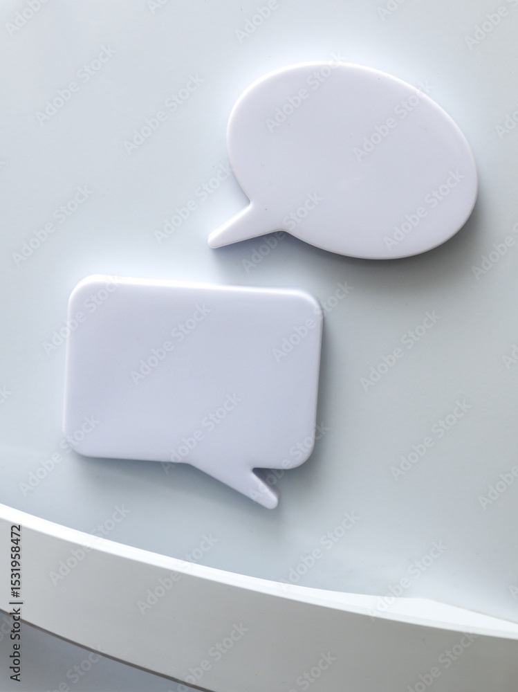 Poster white magnets in the form of a dialog clouds for notes and reminders on the refrigerator door