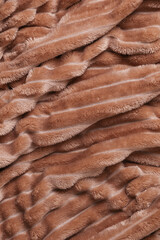 Crumpled wavy brown plaid texture background