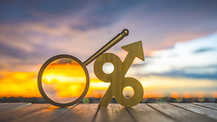 Magnifying glass with percent icon. Discount offers searching. Search for discount sale sign. Finding the lowest interest for real estate loans.