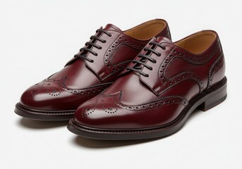 Burgundy leather brogue shoes isolated on white background
