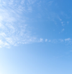 Low angle view and full frame of beautiful blue sky with strange shape of thin white clouds in the morning or afternoon  on sunny day used as natural background texture in decorative art work
