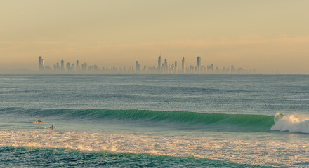 Looking across from Coolangatta to the Gold Coast skyscrapers on a misty morning. Queensland, Australia.