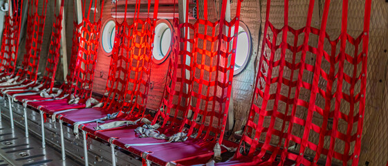 Passenger seats in military transport aircraft, military transport aircraft, and air force fighter aircraft. c130