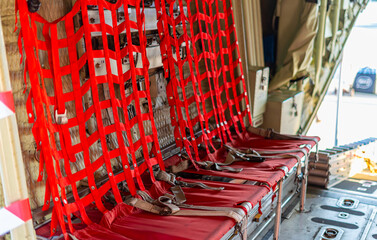 Passenger seats in military transport aircraft, military transport aircraft, and air force fighter aircraft. c130