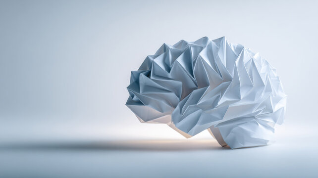 Brain made of origami paper unfolding into light, concept of mental clarity and mindfulness