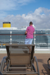 Outdoor whirlpool jacuzzi and private sun deck onboard modern luxury cruiseship cruise ship ocean...