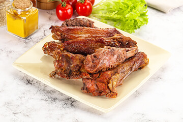 Roasted duck wings with sauce
