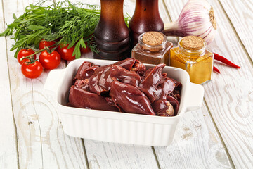 Raw chicken liver uncooked in the bowl