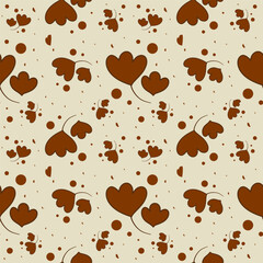 A pattern of brown leaves with a heart in the middle