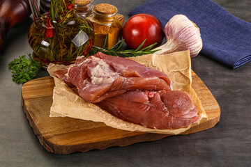 Raw uncooked turkey thigh fillet