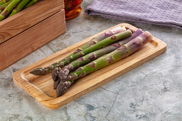 Fresh green asparagus sprouts heap