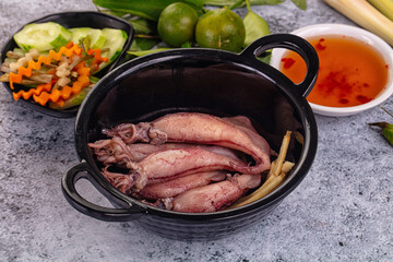 Boiled wild mini calamari snack