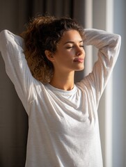 Young caucasian woman relaxing in sunlight with eyes closed.