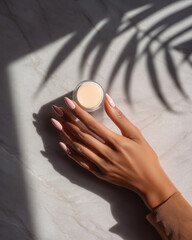 woman with skincare mask getting manicure