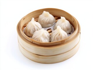 Steamed soup dumplings in bamboo steamer on white background