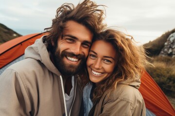 Happy young couple in camping.