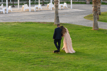 Bride and Groom with Their Dog at Wedding Photoshoot