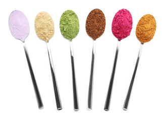 Different superfood powders in spoons on white background, collage. Top view