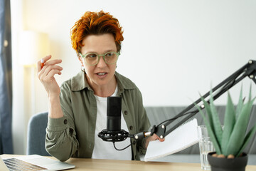 Content creator recording podcast from home studio