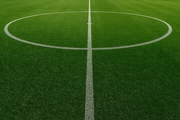 Obraz premium Aerial view showing a bright green soccer field with white line markings and center circle detail.