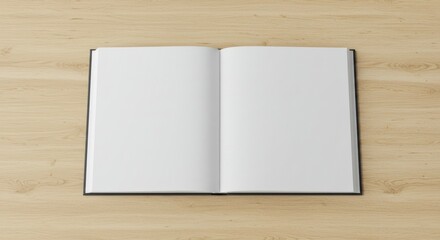 Open book resting on a light wooden surface. Blank pages spread open, showcasing the interior of a black hardback book, showcasing the pages.