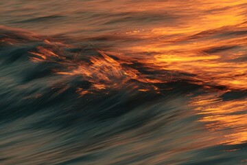 Waves Catch Orange Sunset Light in Motion Blur