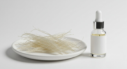Collagen Threads on Plate Beside Dropper Bottle with Blank Label Against White Background