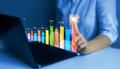 Business person draws increase arrow graph corporate future growth year 2021 to 2026. Planning,opportunity, challenge and business strategy. New Goals, Plans and Visions for Next Year 2026.
