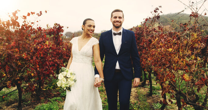 Couple, vineyard and holding hands at wedding with bouquet, love and excited with commitment in nature. People, bride and groom with flowers, smile and loyalty with marriage event at farm in Italy